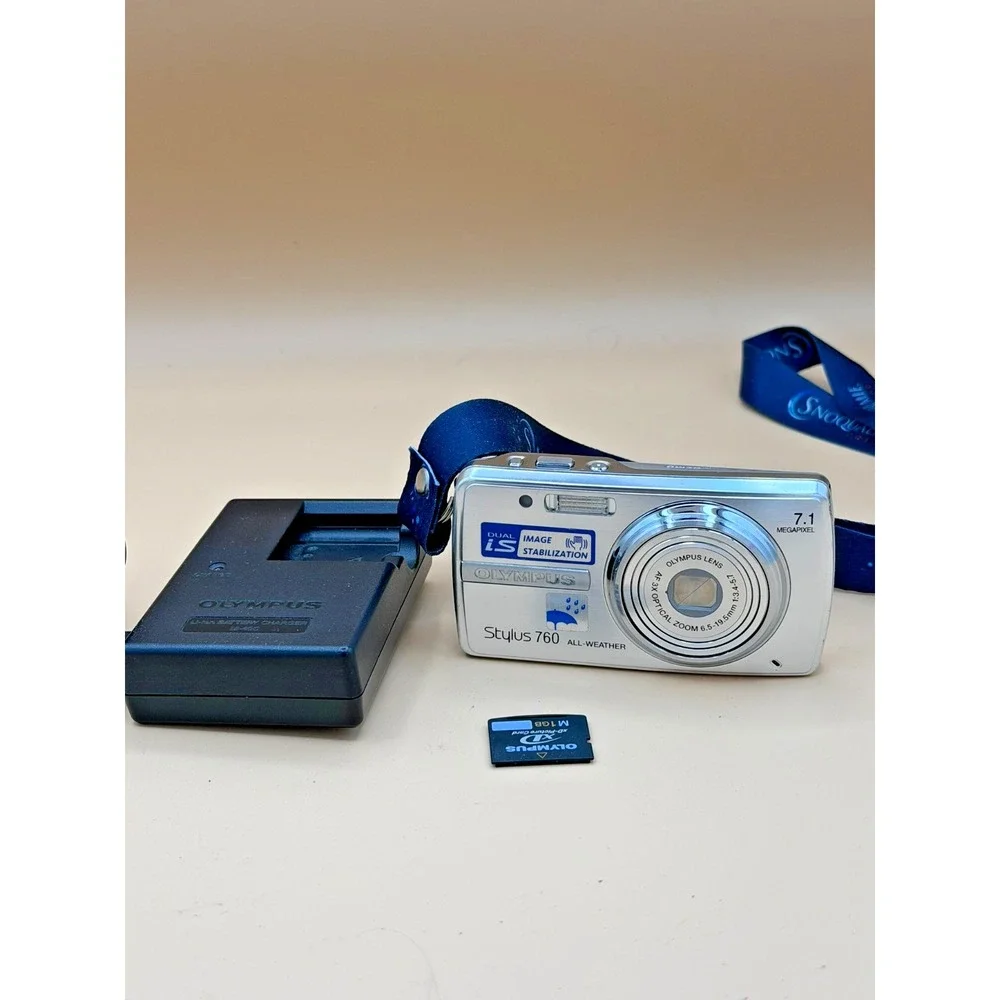 Olympus Stylus 760 7.1MP Digital Camera Silver Tested w/ Charger 1GB xD